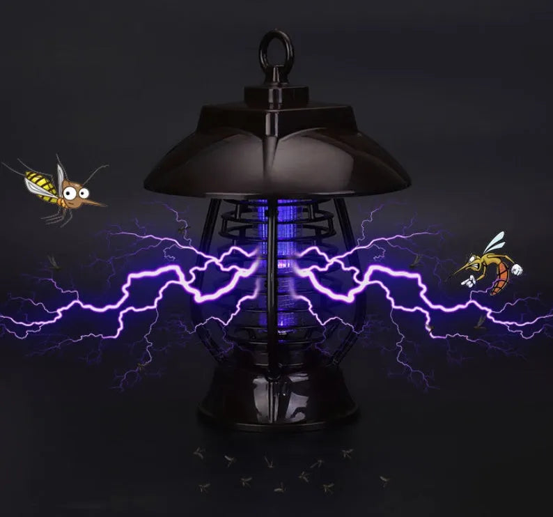 White and black solar-powered mosquito lamp with solar panel on top for outdoor garden use.