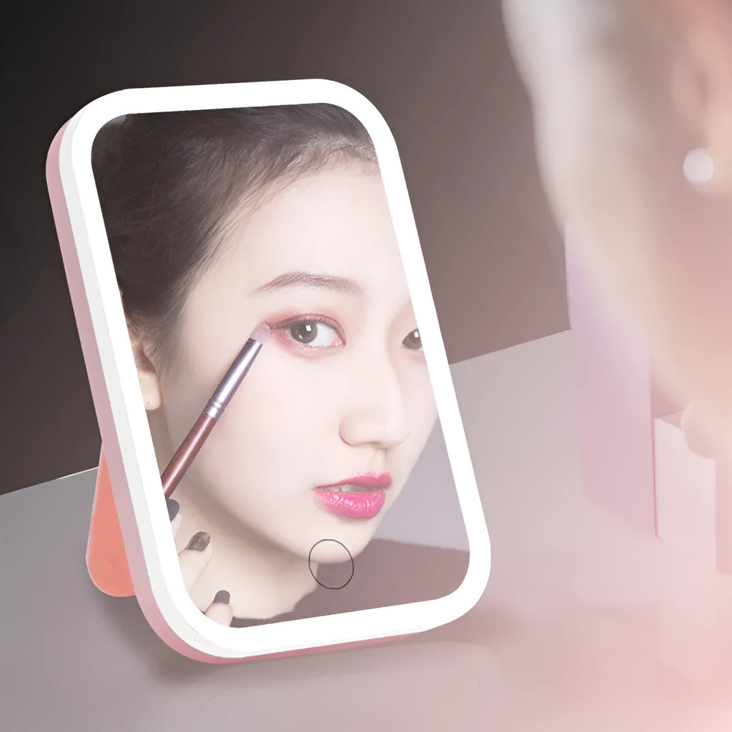 Square LED makeup mirror with smart touch light in pink colour, plastic frame, silver mirror lens