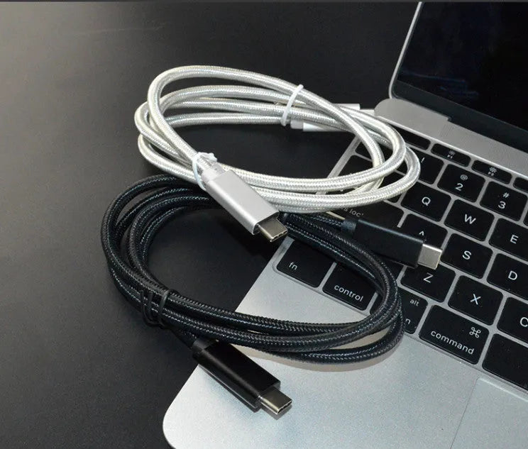 Black nylon braided USB-C data cable with metal shell, supporting 100W charging and 4K video output