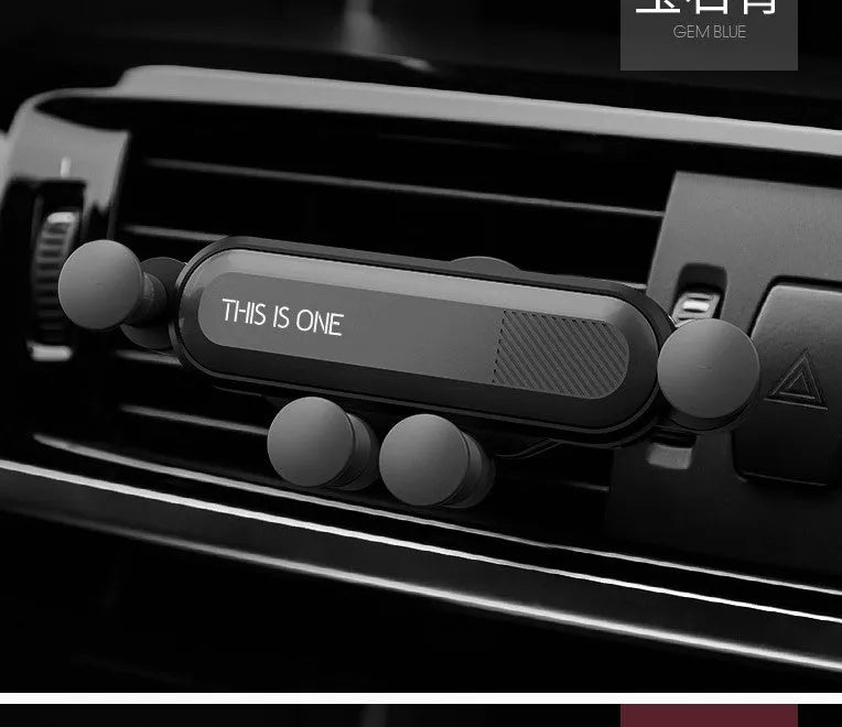 Universal car air vent phone holder with adjustable grip in black colour mounted in vehicle