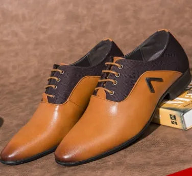 Men's black oxford shoes with low upper height and rubber sole on size chart background