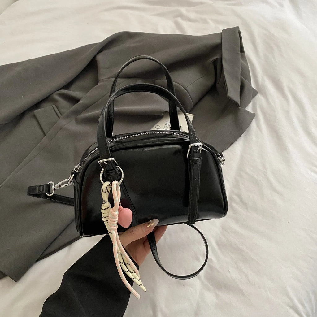 Korean style small square shoulder bag in soft PU leather with shell silhouette