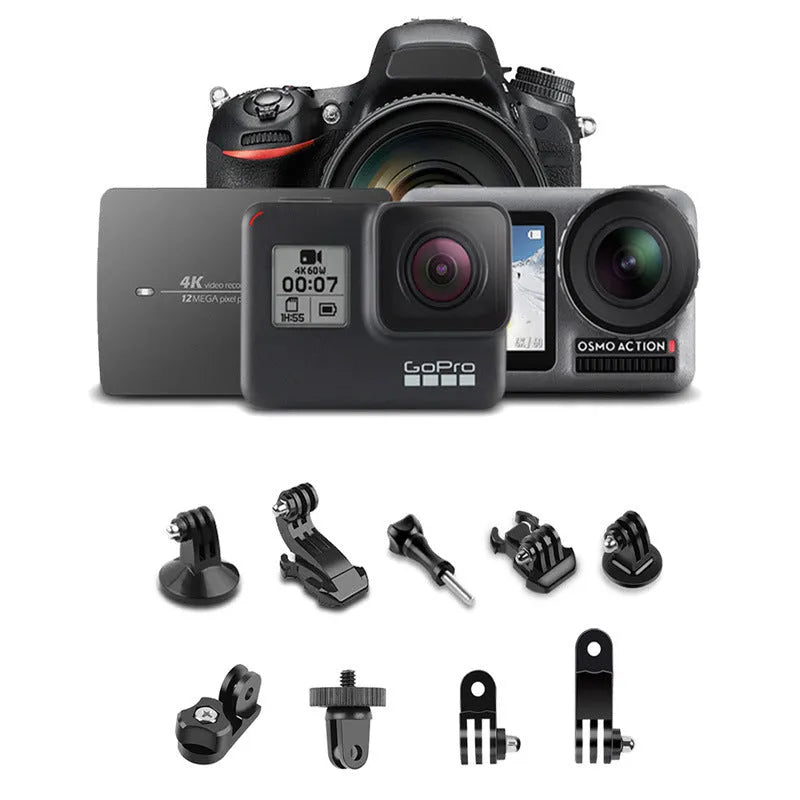 Black Bluetooth selfie stick with wireless remote, extended next to a phone and GoPro camera on its tripod base.