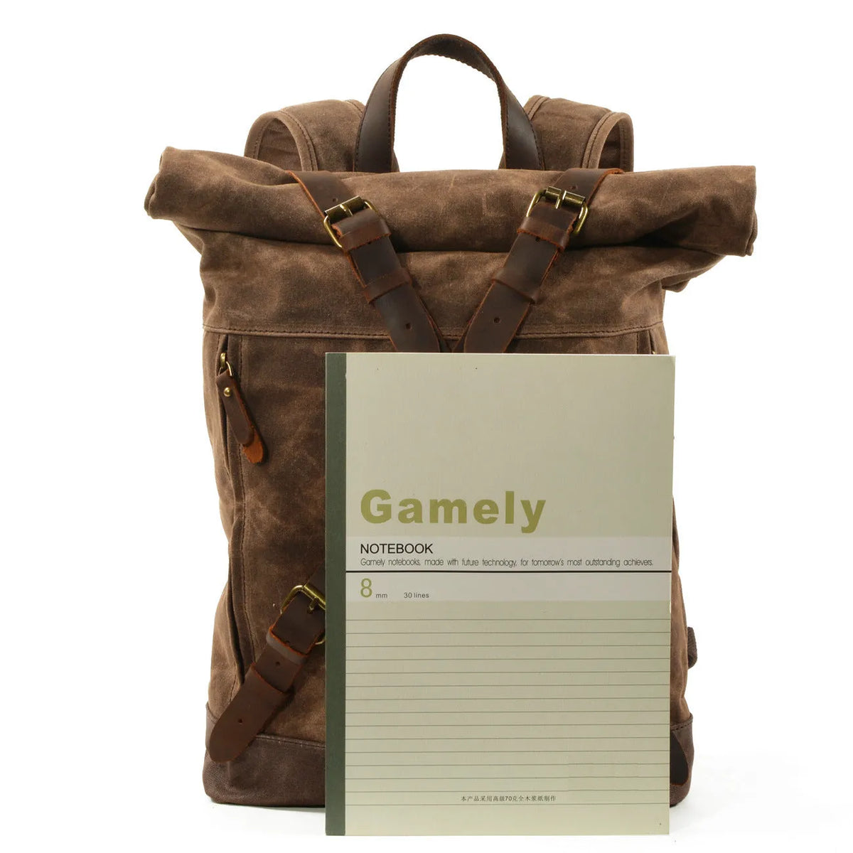 Waterproof canvas rucksack with linen lining, 20-35L capacity, softback design, shown in black, coffee, or celadon colour options.