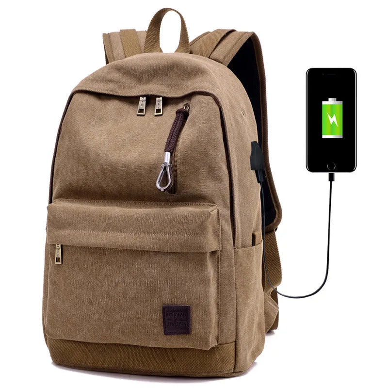 Canvas backpack with USB charging port showing computer compartment and multiple pockets