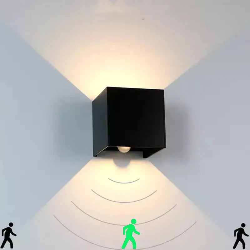 Black adjustable colour temperature aluminium indoor corridor wall lamp mounted on a wall