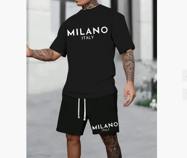 Polyester short sleeve suit set with matching shorts in multiple colours on a hanger.