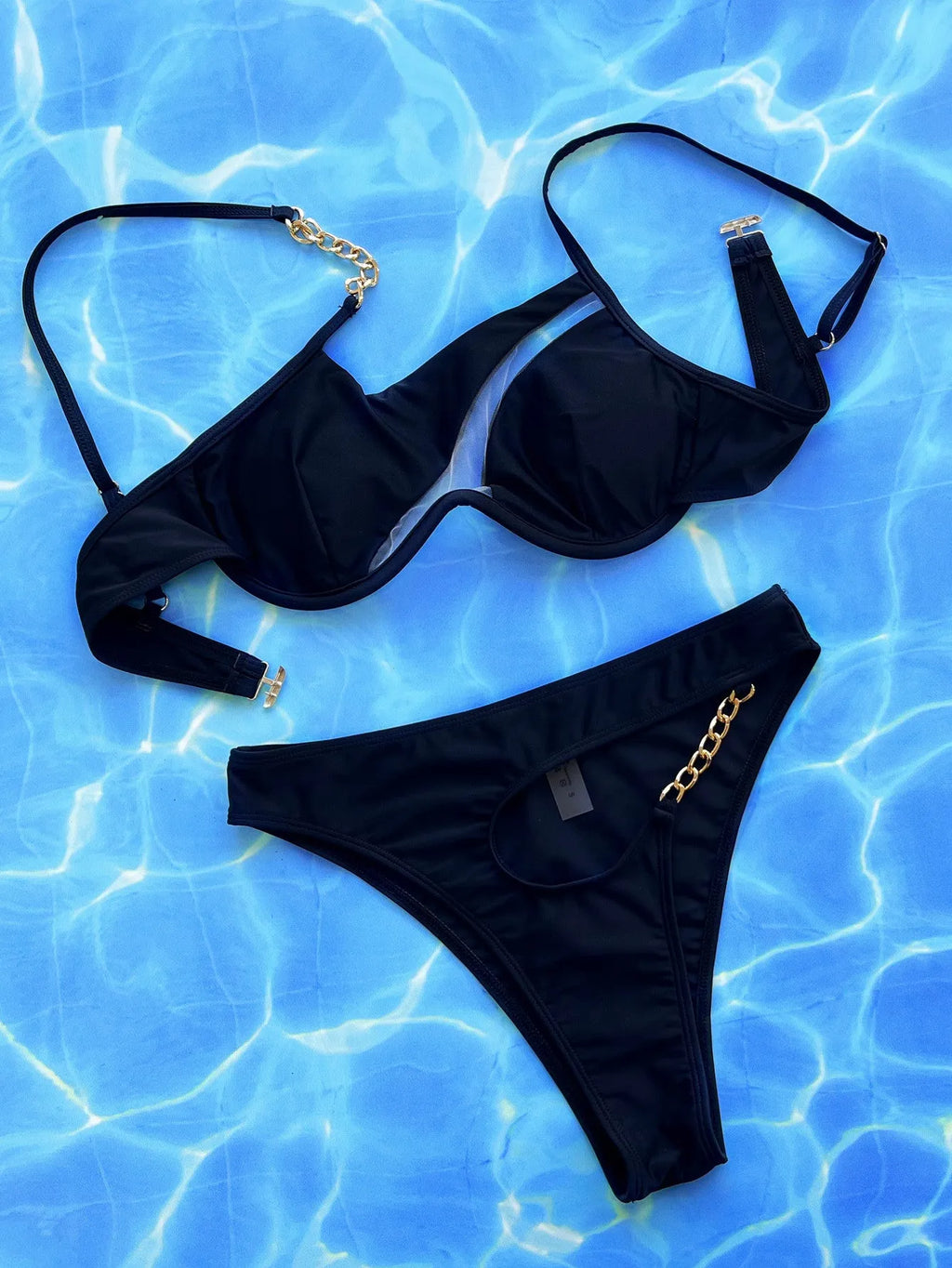 Black women's two-piece nylon swimsuit for swimming, shown as separate top and bottom.