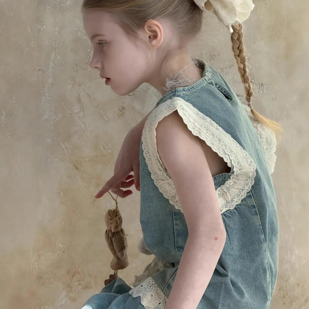 Light blue girls' lace trim denim cropped wide-leg pants and sleeveless vest two-piece set on model
