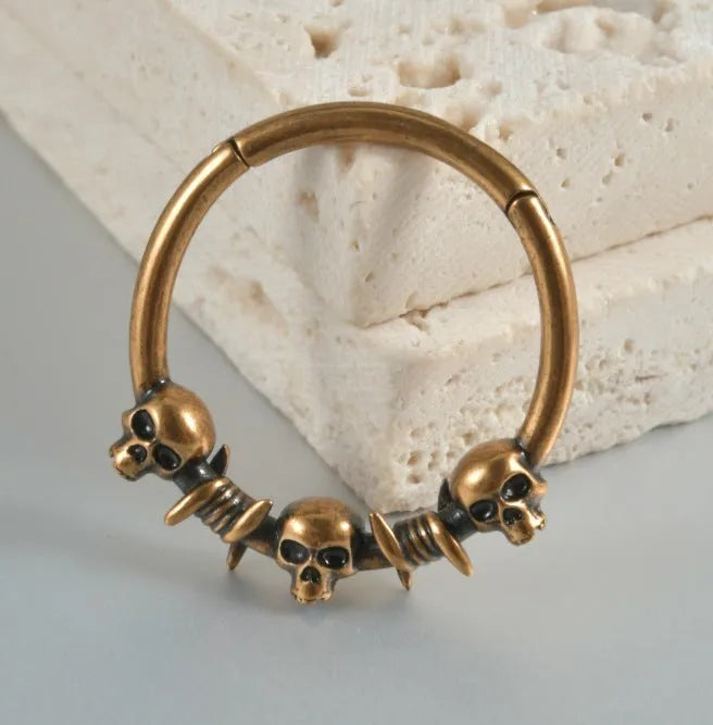 Copper punk earrings with ghost head design in antique silver or ancient gold finish