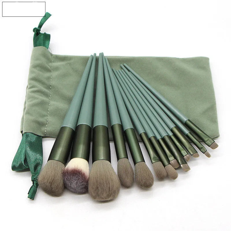 13 piece green makeup brush set with man-made fibre bristles and plastic handles