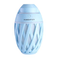 Football humidifier in blue, 90x90x150mm, made of ABS, PP, and silicone on a desk