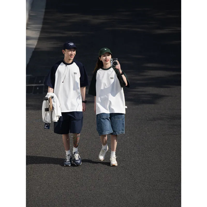 Men's blue casual Japanese-style T-shirt with raglan sleeves on a hanger