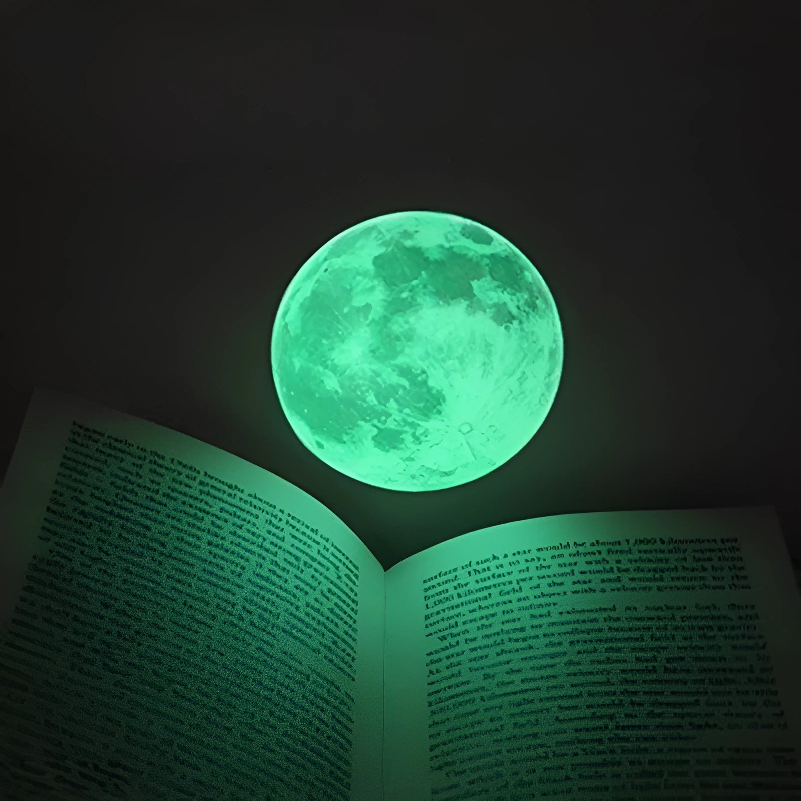 30cm green fluorescent moon wall sticker with super bright glitter finish on a bedroom wall