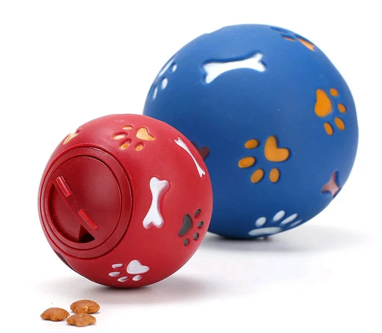 Rubber puzzle ball for dogs with uneven surface, footprints pattern, blue and red colours, sizes 7.5cm and 11cm