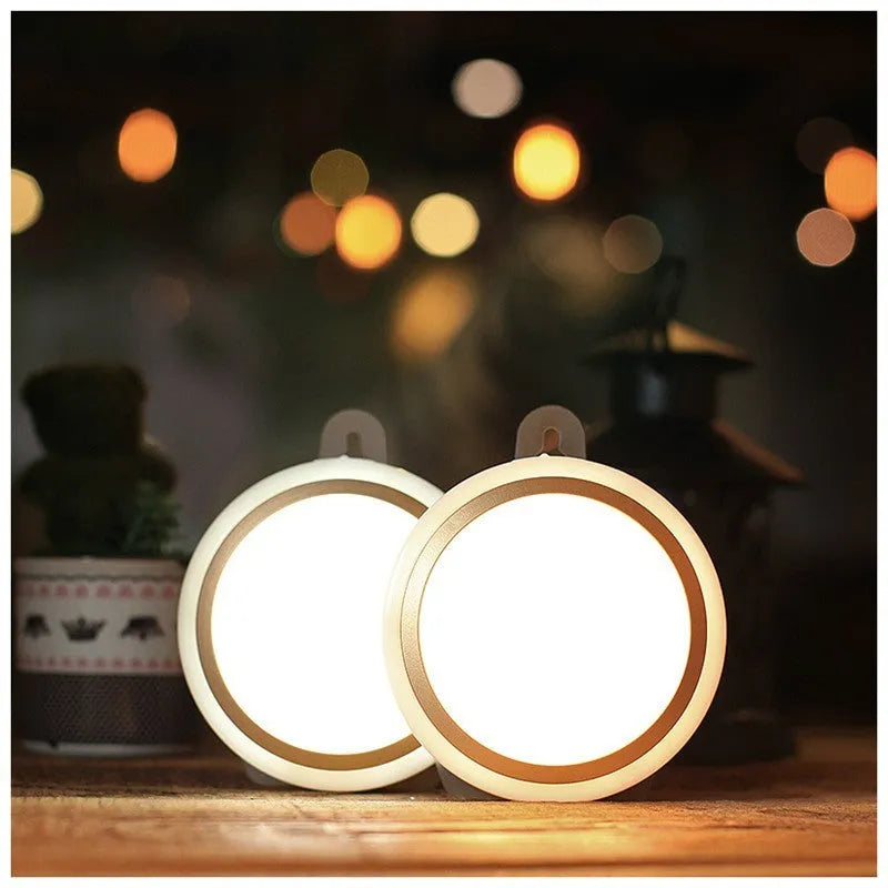 Circular white motion sensor LED light unit showing 80mm diameter on a table.