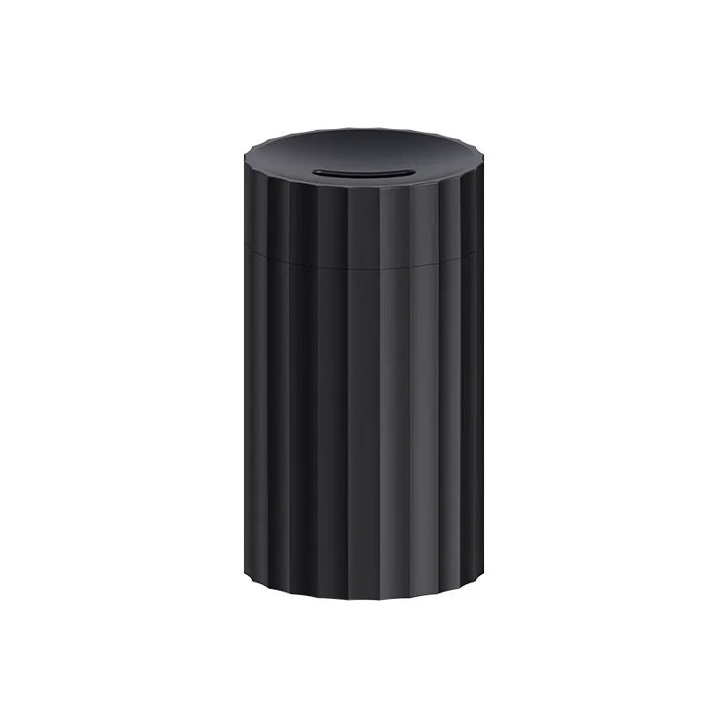 Black and white essential oil diffuser and humidifier with a simulated LED flame effect on a table.