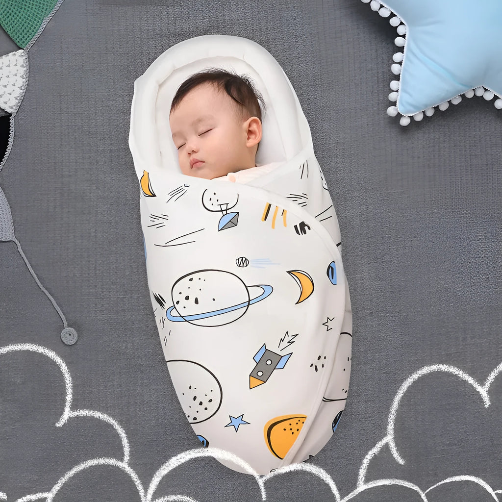 Cotton anti-startle swaddle blanket for babies in a colourful dinosaur print, 30 by 60 cm.