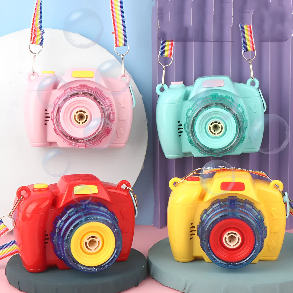 Yellow, green, red, and pink camera-shaped automatic bubble blowing toy for children on a white background.