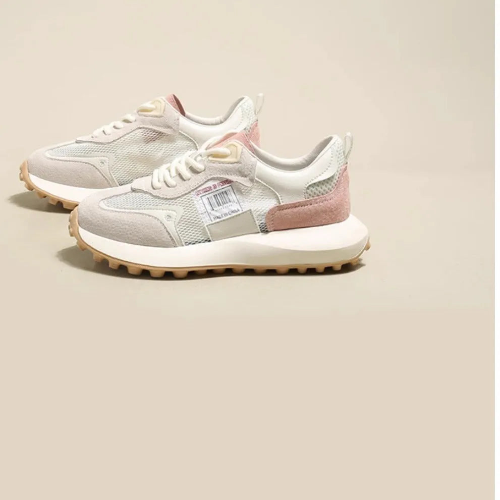 Women's grey and pink low-top retro sneaker with round toe and flat rubber sole