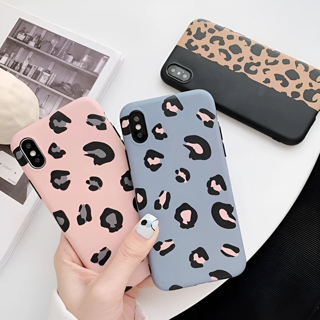 Leopard print pattern hard case for iPhone in black, blue, or pink.