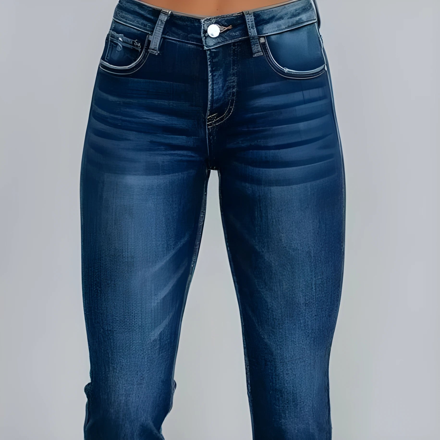 Women's dark blue denim jeans with hand-worn distressing detail on a hanger.
