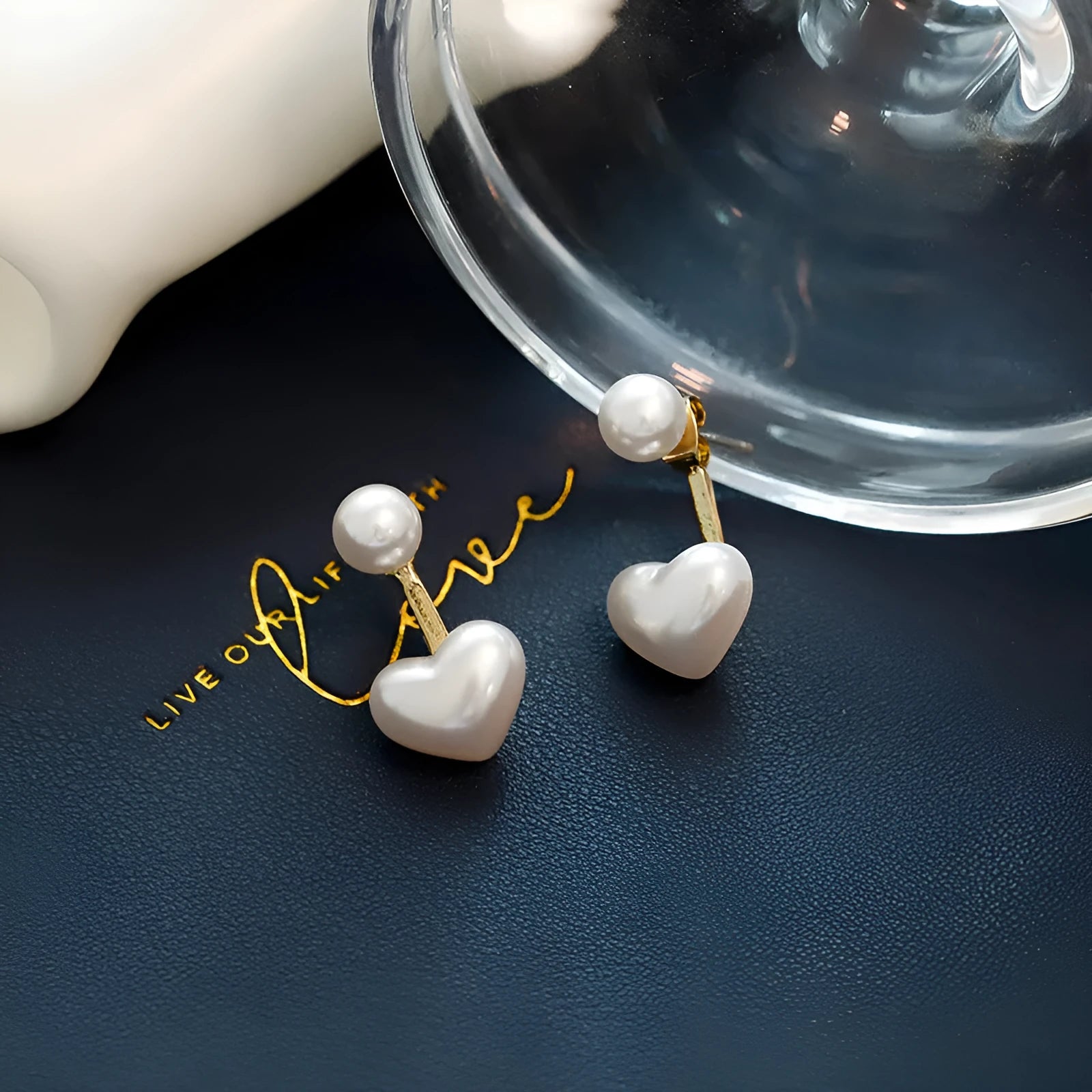 Pair of women's heart-shaped alloy stud earrings with artificial gemstone inlay, Korean style.