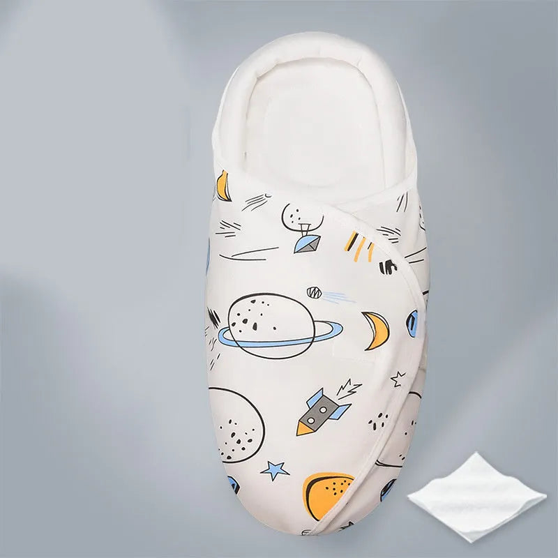 Cotton anti-startle swaddle blanket for babies in a colourful dinosaur print, 30 by 60 cm.
