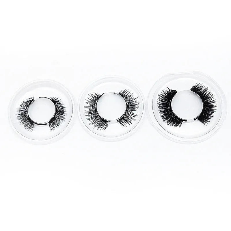 Three pairs of black quantum magnetic false eyelashes with ice silk hand-leg hair and a quantum eyelash curler.