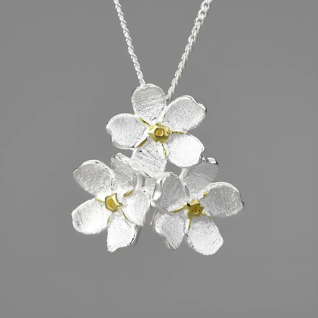 Myosotis Sylvatica sterling silver flower pendant in pastoral style with three finish options