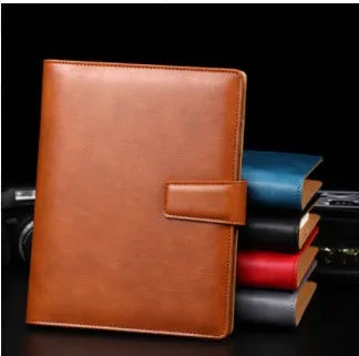 A5 hardcover PU binder notebook with metal buckle clip, shown in multiple colours.