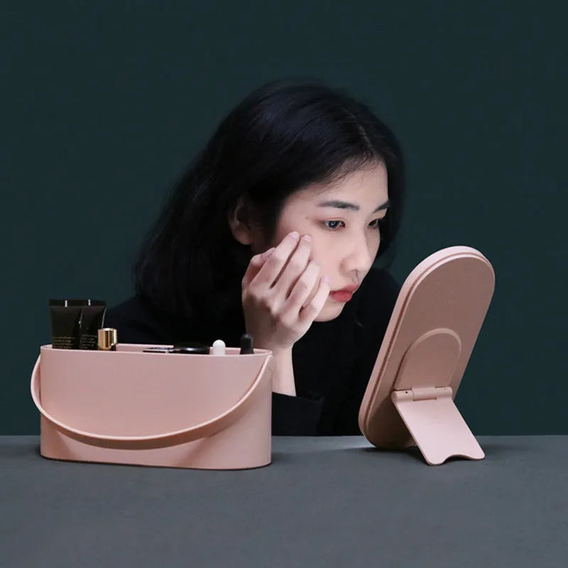Portable LED mirror makeup organiser box with touch light, rotatable bracket, and soft handle in white