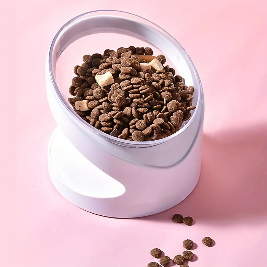 Clear plastic elevated cat food bowl with a tilted feeding platform.