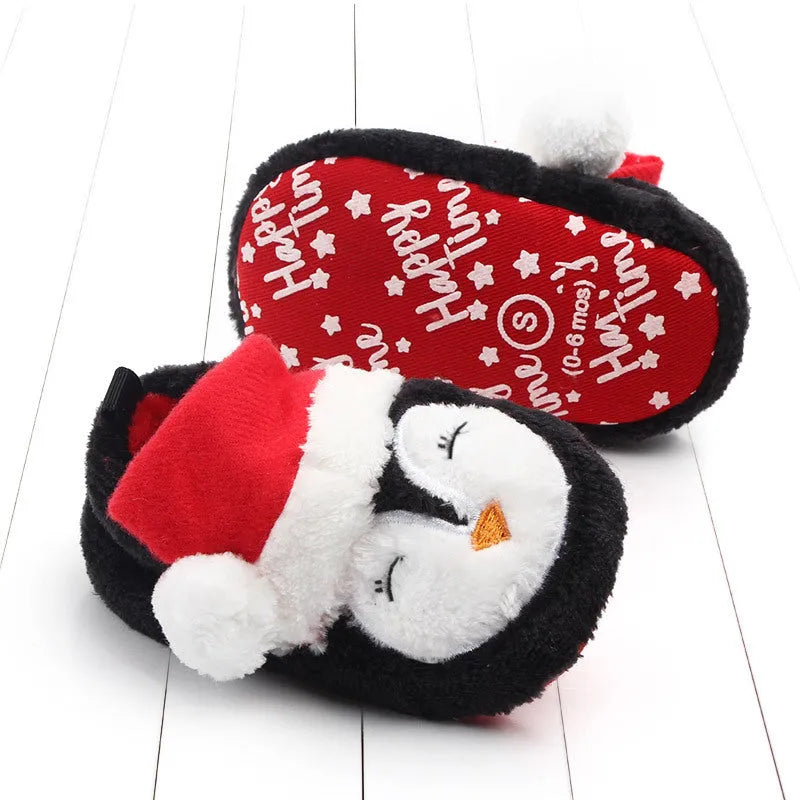 Toddler coral fleece shoes with non-slip sole in Christmas penguin design, low tube sleeve style