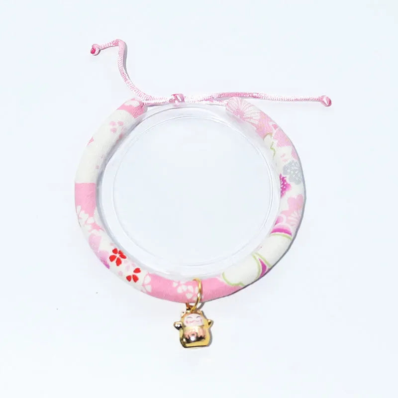 Cat collar with small Japanese bell made from cotton, linen, and copper, available in Black big flower and Red plum
