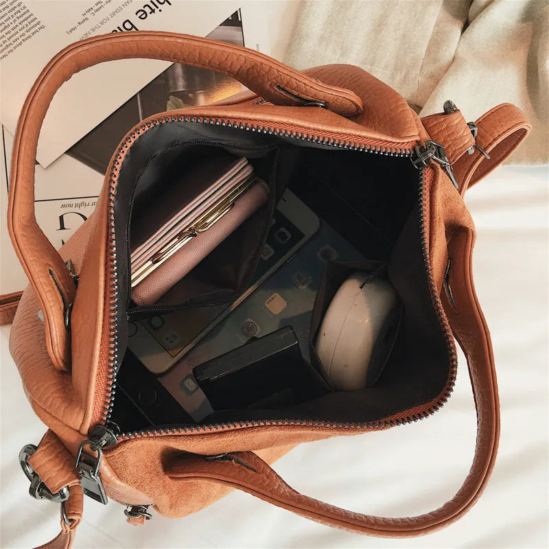 Soft PU casual women's tote shoulder bag in a neutral colour with zip closure.