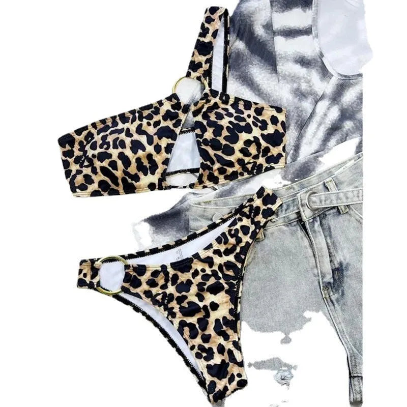 Women's hollow leopard print polka dot nylon bikini set with top and shorts, available in S M L sizes