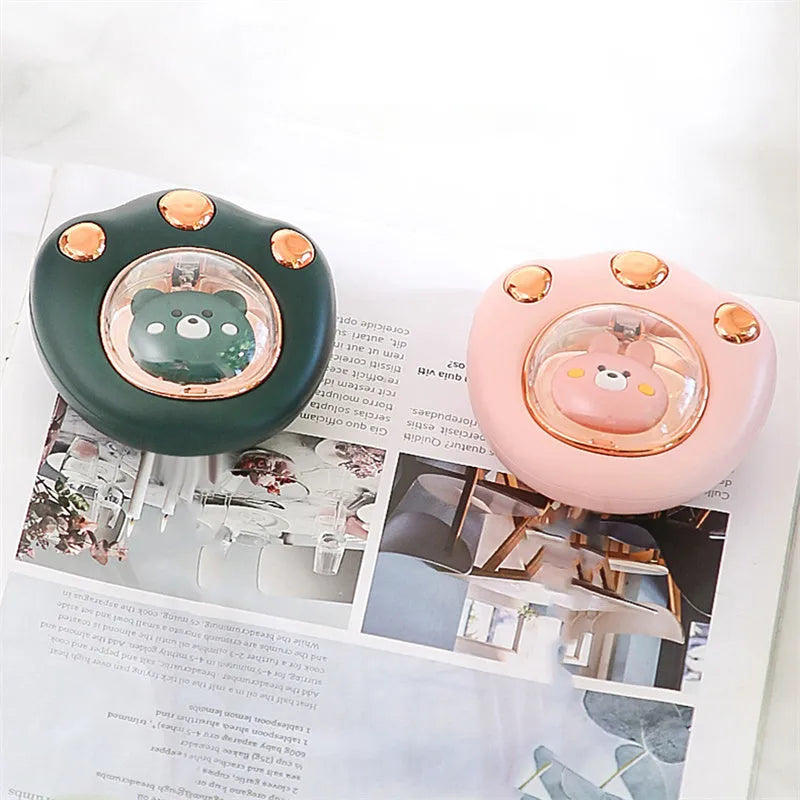 Mini electric hand warmer in cat paw shape, USB rechargeable, in white colour option, palm-sized