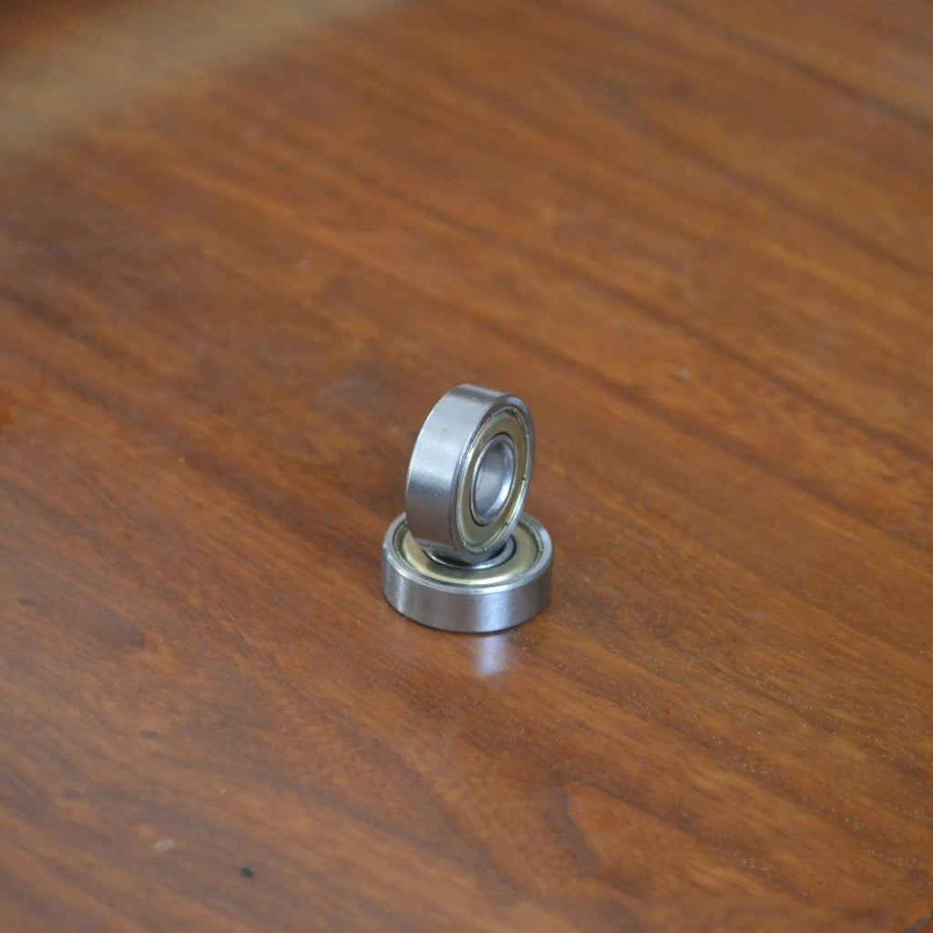 6000zz deep groove ball bearing with carbon steel construction and 10mm inner diameter, 26mm outer diameter.
