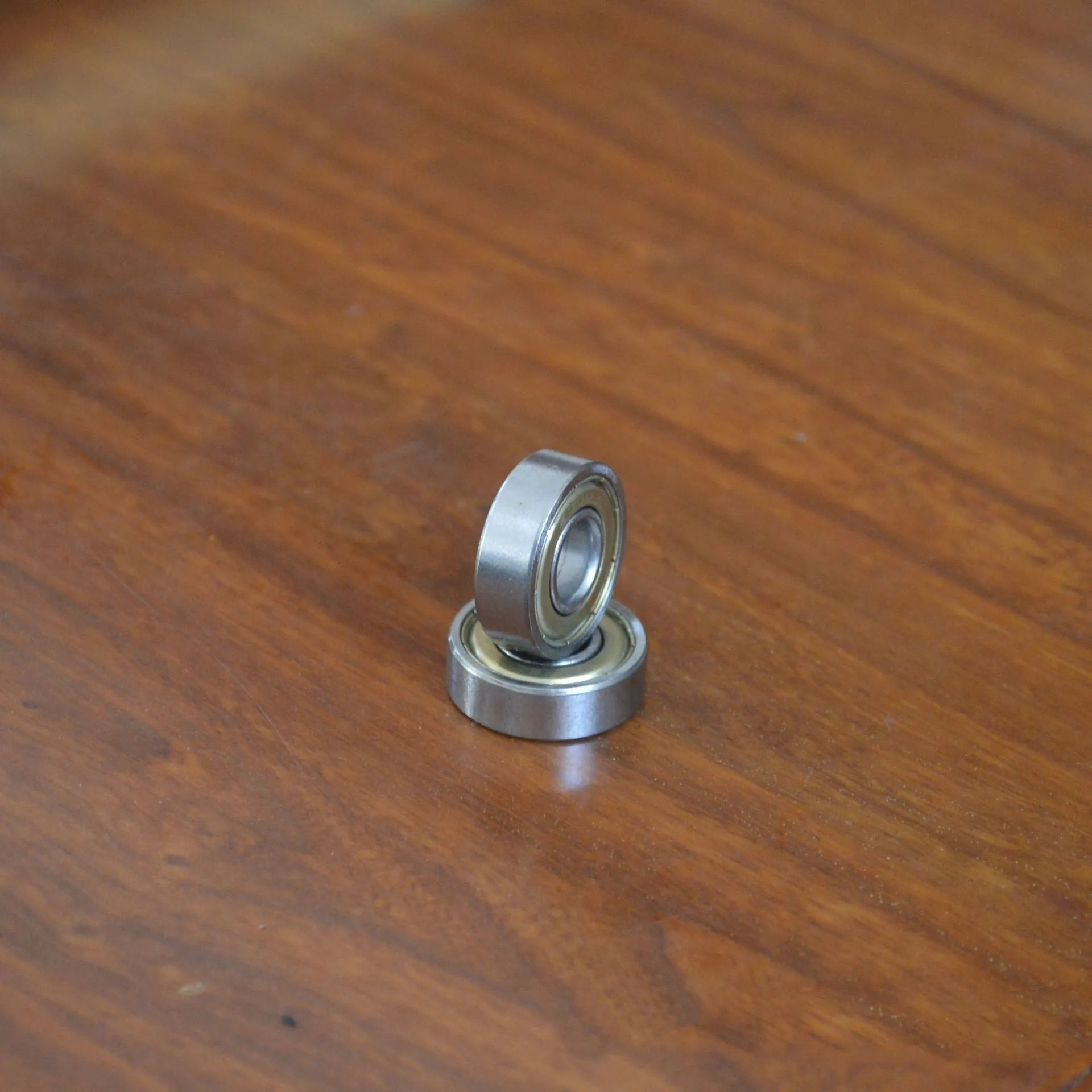 6000zz deep groove ball bearing with carbon steel construction and 10mm inner diameter, 26mm outer diameter.