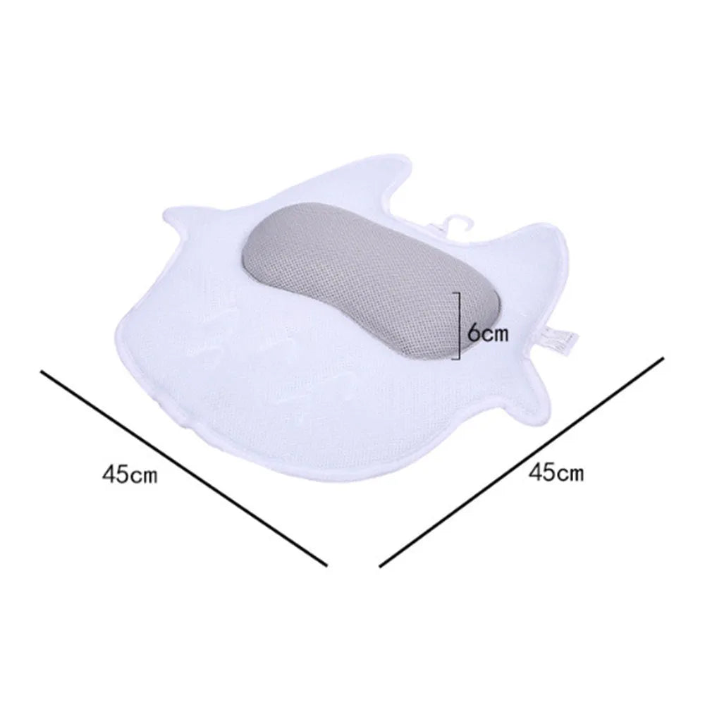 White ergonomic bathtub pillow with owl shape, 5D mesh fabric, and strong suction cups on a smooth bath surface