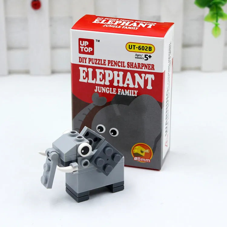 DIY building block pencil sharpener in plastic with Elephant or Lion animal modelling, manual operation, 60 x 30 x 88 mm.