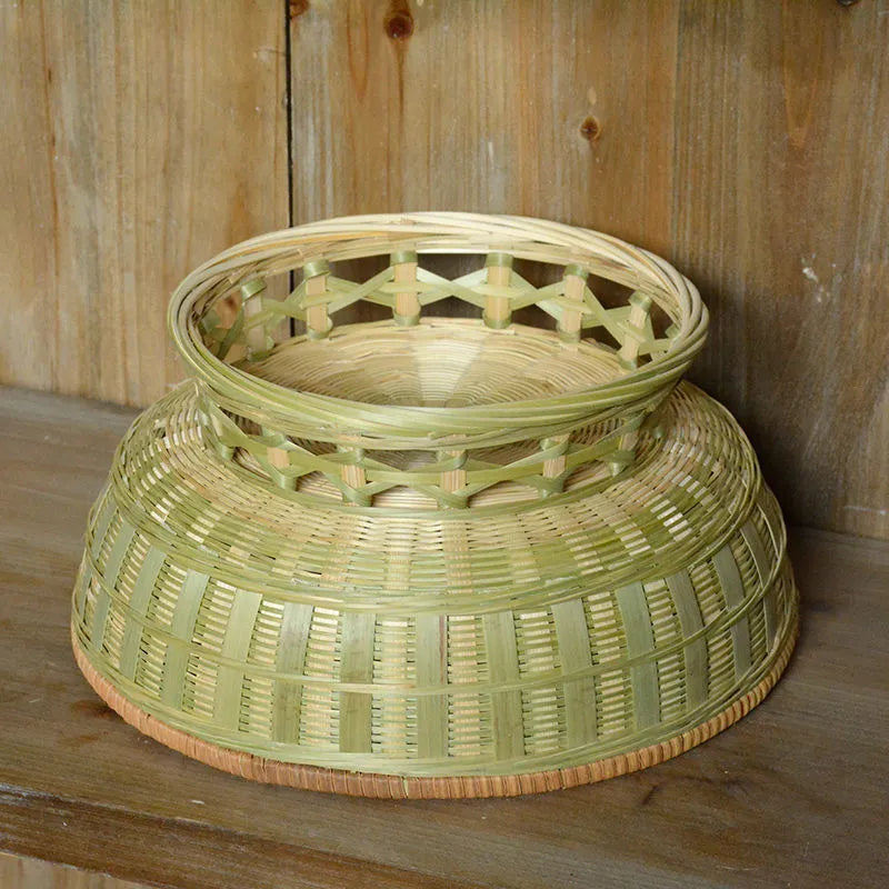 Handmade natural bamboo storage basket in traditional woven construction