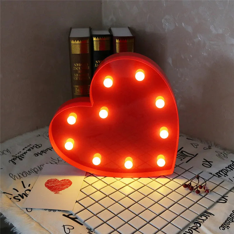Romantic 3D love heart marquee letter nights lamp in pink plastic with warm white LEDs, wall mounted