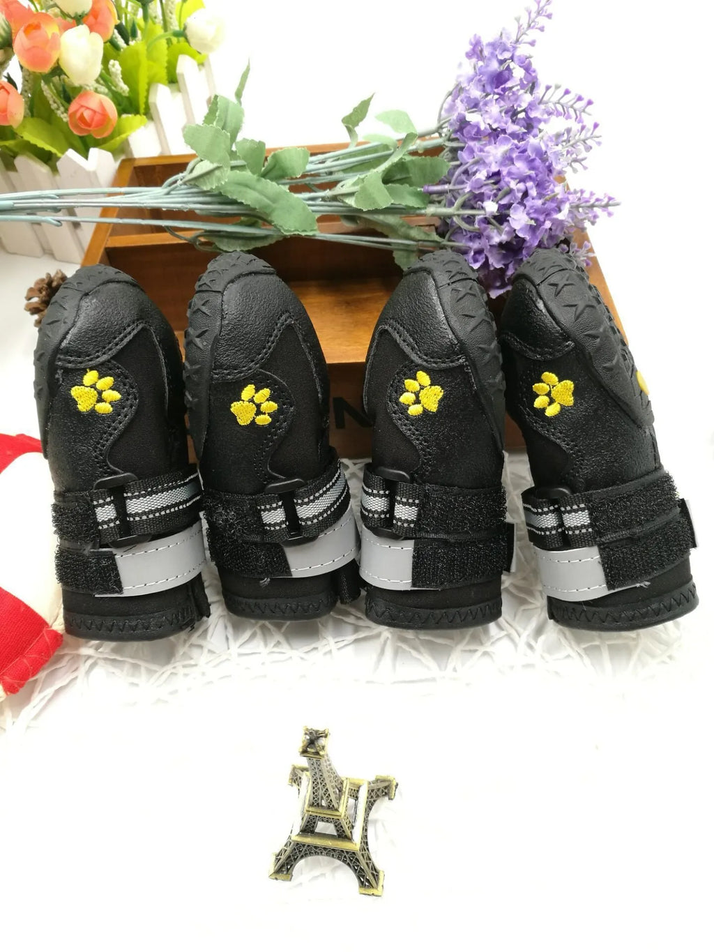 Black waterproof dog shoes with non-slip PVC sole, adjustable fuzzy belt