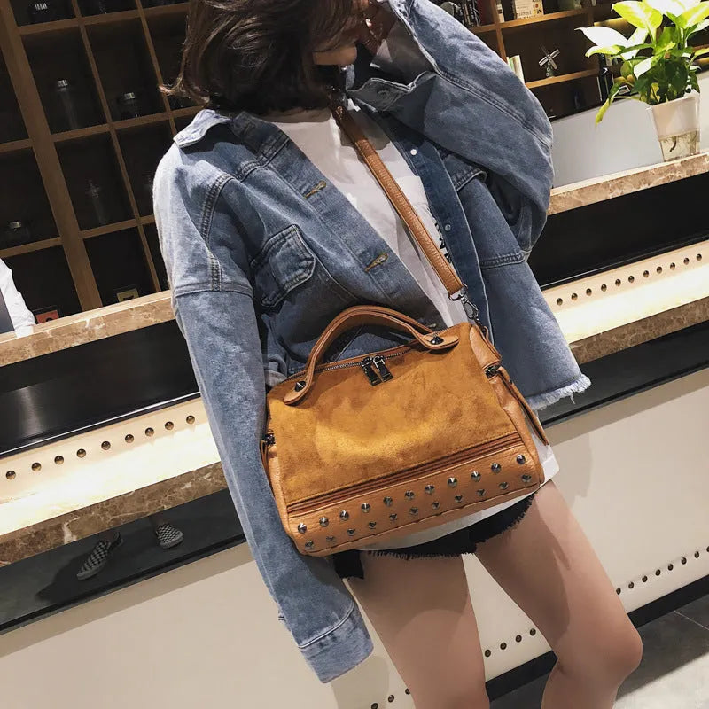 Soft PU casual women's tote shoulder bag in a neutral colour with zip closure.