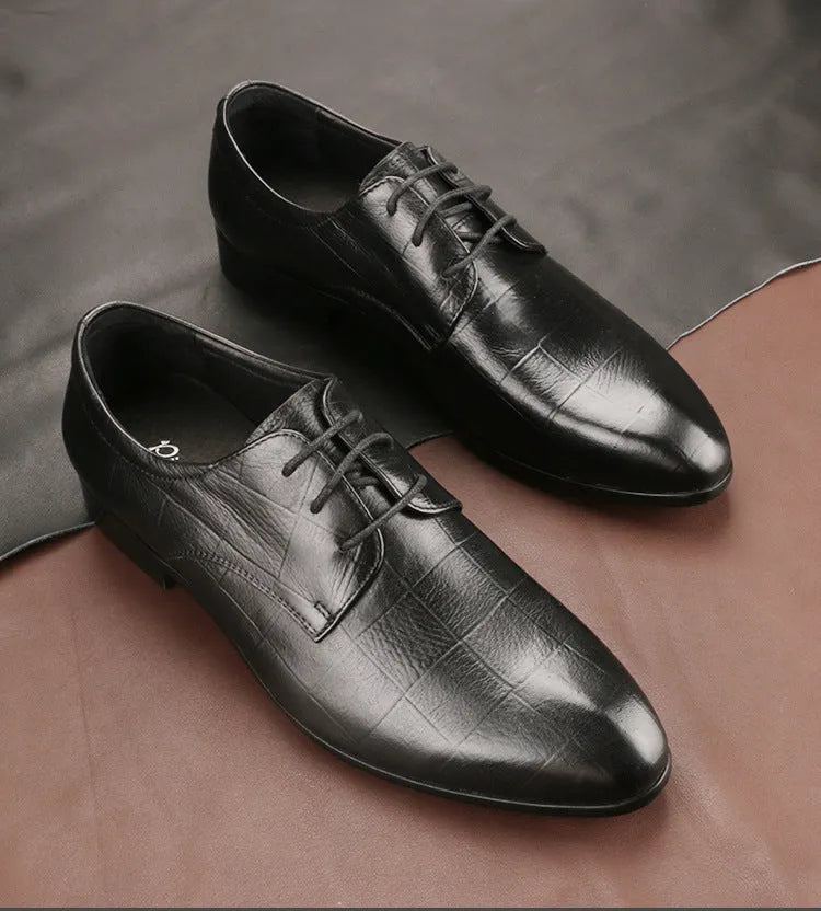 Men's black leather derby shoes with checkered detailing and pointed toe