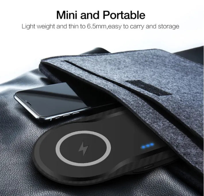 Black dual wireless charging pad charging two smartphones simultaneously with Type-C cable