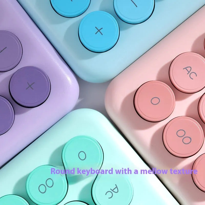 Desktop calculator with gradient colour options: violet, cherry blossom powder, glacier blue, and mint green.
