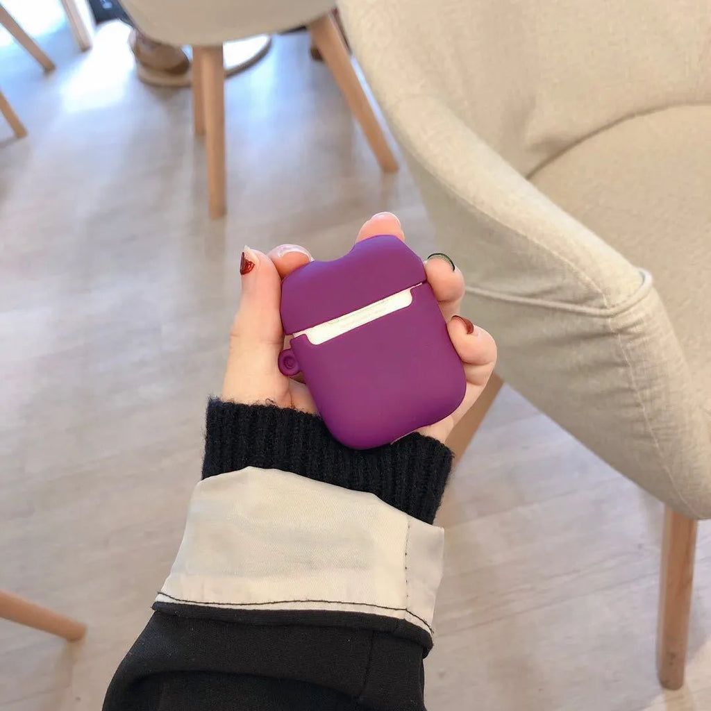 Silicone protective cover compatible with AirPods second generation in purple and yellow colour options